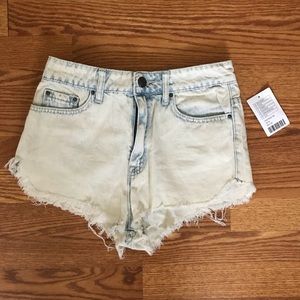UO Super High Rise Distressed Shorts